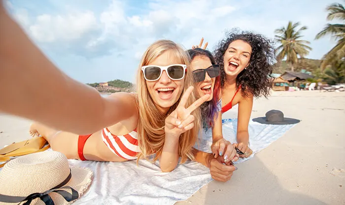 women having at beach