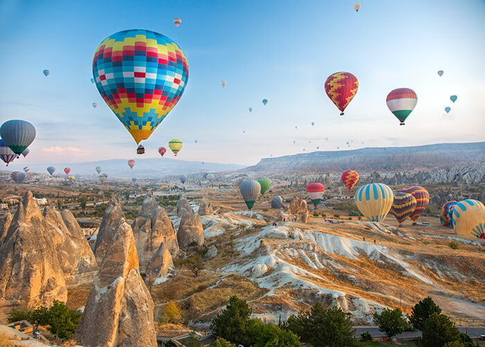 Hot air balloon flying over Cappadocia